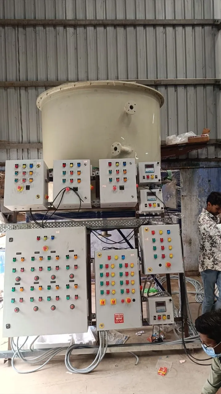Chemical dosing system with a bank of motor starter panels below the preparation tank