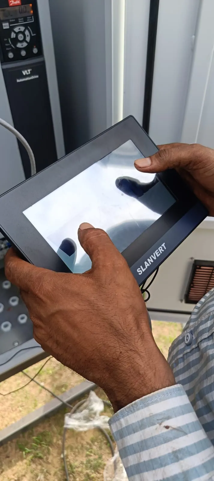 Commissioning a plant through the HMI touchscreen alongside a variable frequency drive